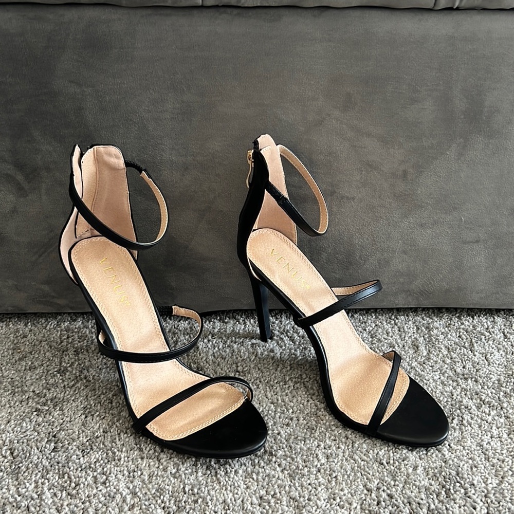 Black heels never worn, 4.5”in  , zip up in back